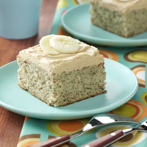 two pieces of banana cake on blue plates