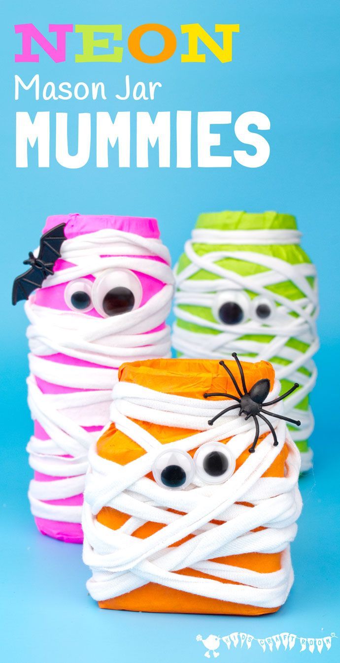 these halloween mason jar mummies are so cute and easy to make they look like they have eyes on them