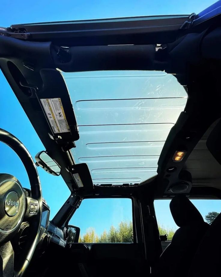 the interior of a vehicle with its sunroof