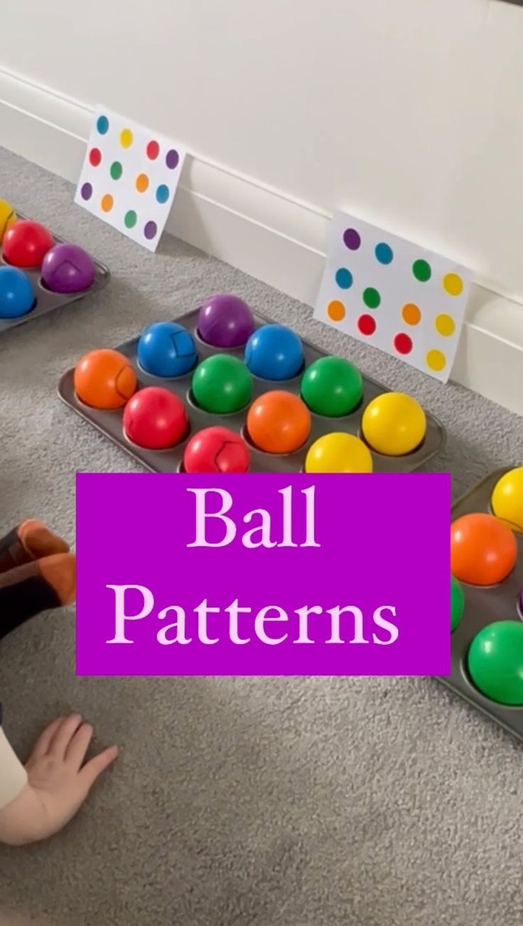 two children playing with colorful balls in a playroom, and the words ball patterns above them