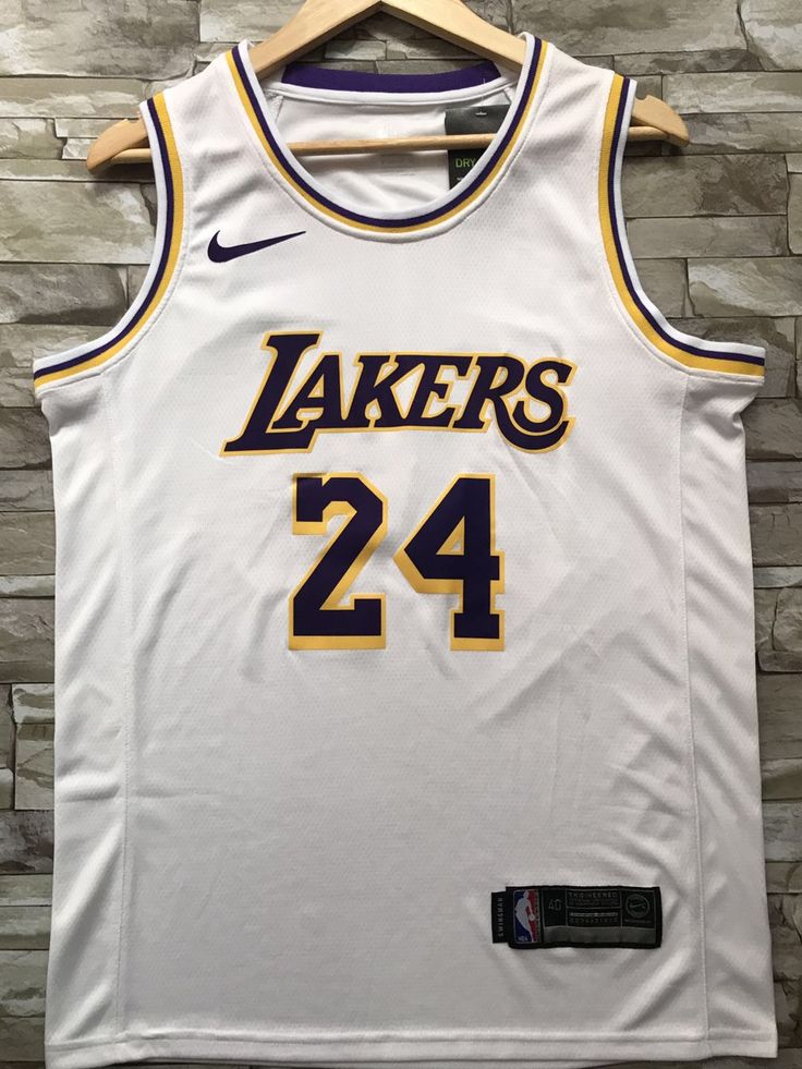 the los lakers jersey hangs on a hanger