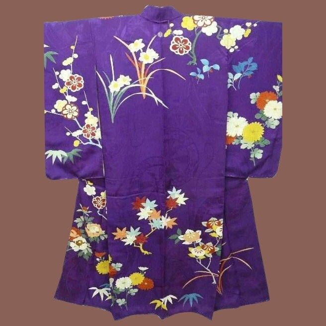 "Deep Purple Antique Japanese Silk Furisode Kimono c1900 Meiji era. Beautifully embroidered with flowers and trees and embellished with gold hand painted detail, the deep purple pure silk crepe background has a self pattern of wheels. The flowers are Chrysanthemums (Kiku), Citrus (Tachibana), Peonies (Botan), Maple leaves (Momiji) and (most unusual) Daffodils! In divine shades of peach, white, yellow, orange, rust, green, black, red and blue. The beautiful floral design is a mix of embroidery an Luxury Purple Silk Kimono, Traditional Embroidered Kimono For Tea Ceremony, Traditional Floral Print Kimono For Tea Ceremony, Yellow Kimono, Furisode Kimono, Meiji Era, Wedding Kimono, Shades Of Peach, Japanese Samurai