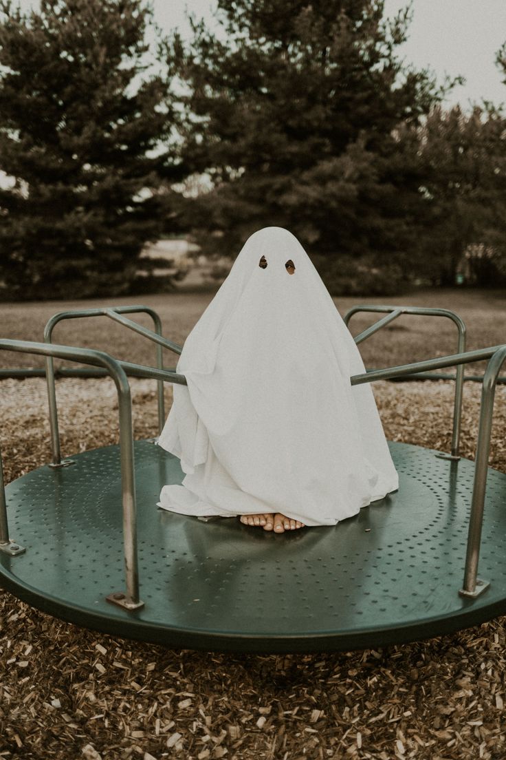 a ghost sitting on top of a metal frame