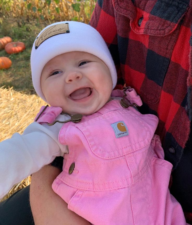 Baby smiles #carhartt #beanies #reeceleigh Pink Carhartt Beanie Outfit, Country Baby Girl Outfits, Baby Carhartt Outfit, Carhartt Baby Outfits, Western Baby Pictures, Baby Girl Carhartt Outfits, Baby Carhartt, Newborn Carhartt Hat, Carhartt Baby Girl