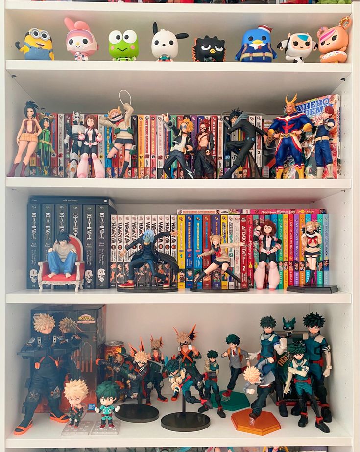 my hero academia manga shelf Anime Figures Display Ideas, Display Figures Ideas, My Hero Academia Collection, Anime Figure Organization, Mha Manga Collection, My Hero Academia Bedroom Ideas, Anime Figure Shelf Display, Anime Room Setup, Anime Collection Display