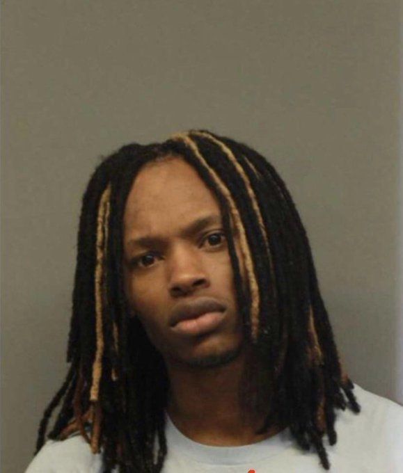 a man with dreadlocks is shown in this mugshot from the police department