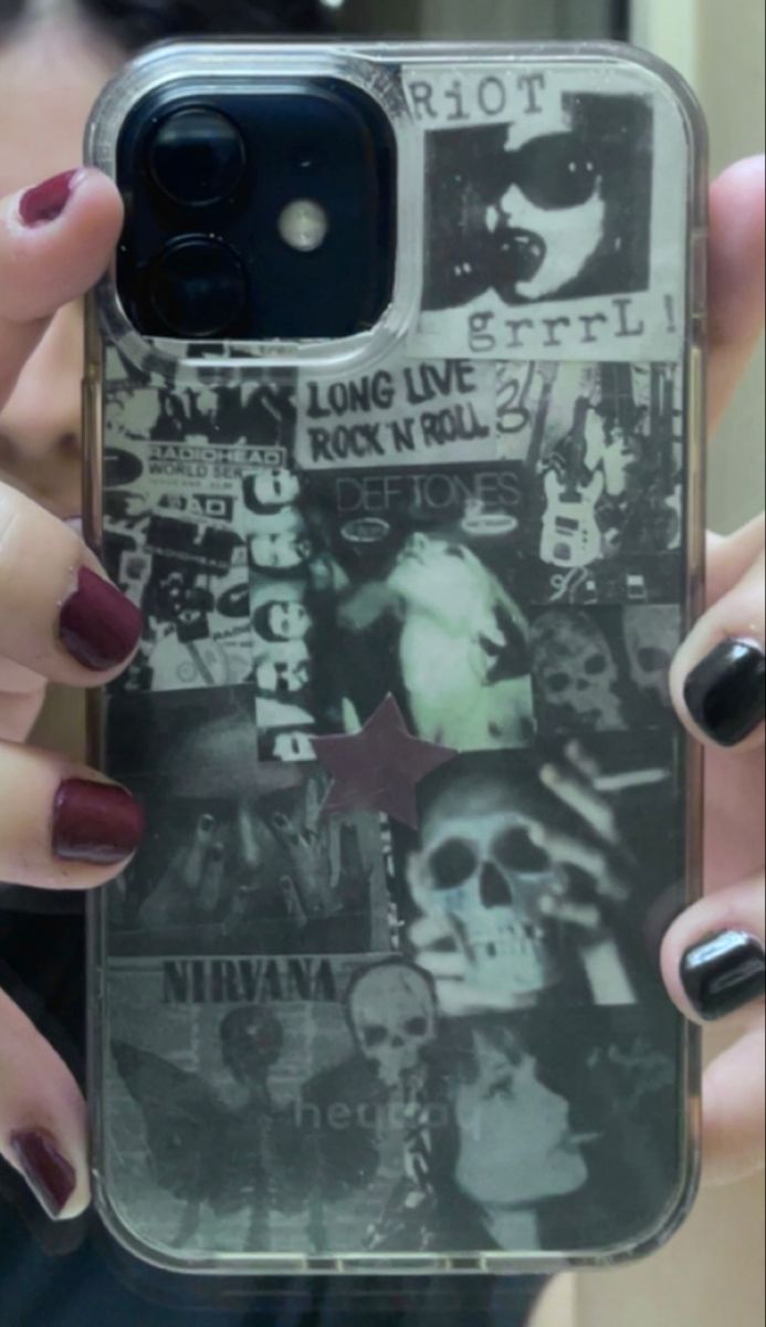 a woman holding up a cell phone case with pictures on the front and back of it