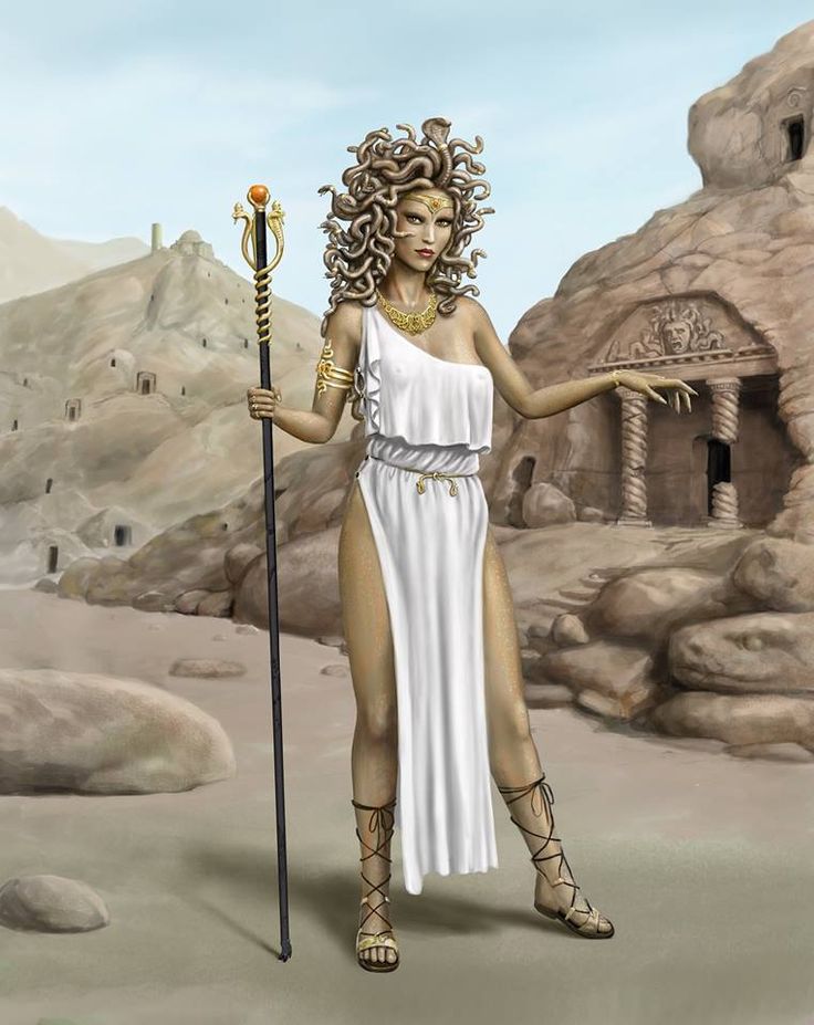 a woman in a white dress holding a staff and standing on the desert with her hands behind her back