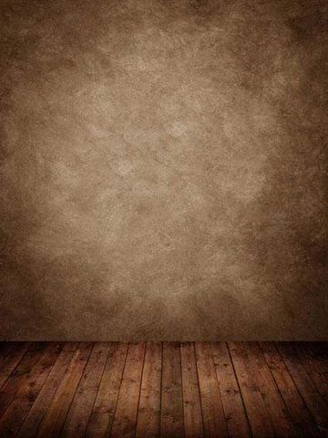 an empty room with wooden floors and a brown wall