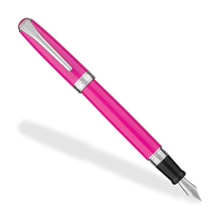 a pink ballpoint pen sitting on top of a white surface