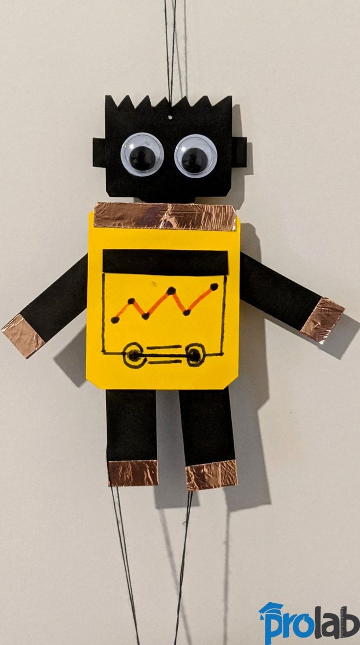 a paper doll made to look like a robot