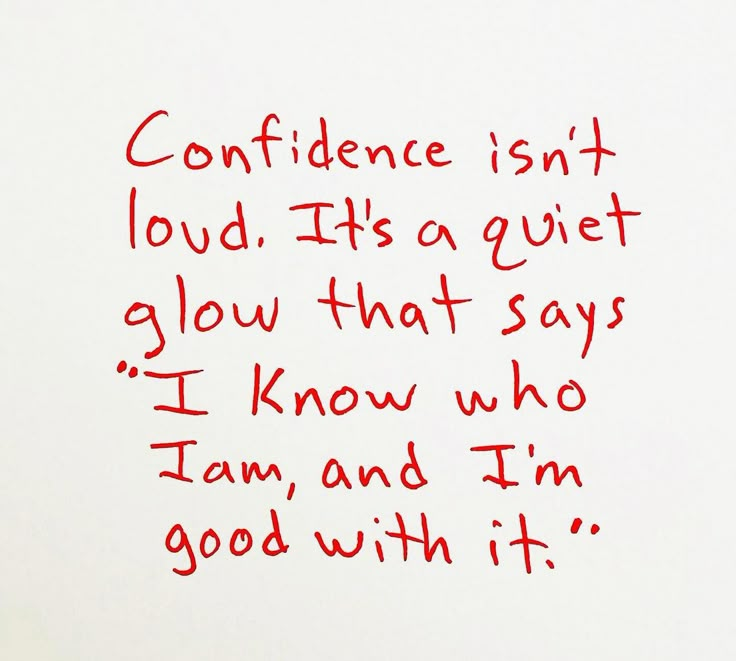 a handwritten note on white paper with red ink that reads, confidence isn't loud its a quiet glow that says i know who i am and im good with it