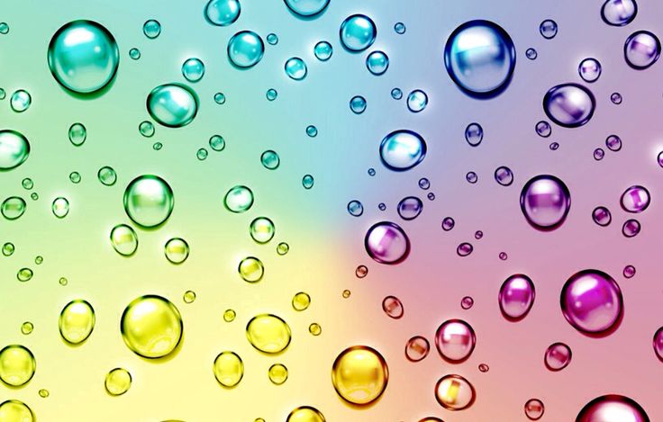 water droplets are shown on a multicolored background