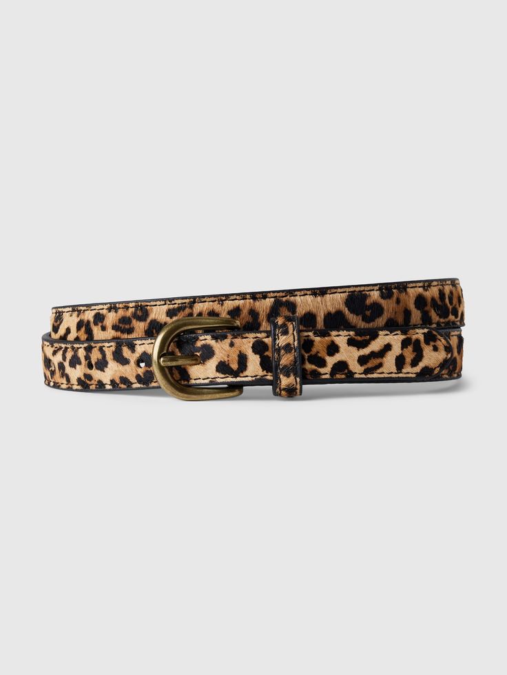 Smooth leather belt.  Gold round buckle at front.  Allover leopard print.  For more fit and sizing info, check out our Size Guide.  Width: 0. 75" Length Size S): 39"