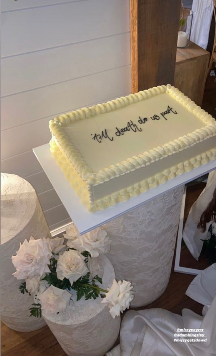 a large sheet cake sitting on top of a table