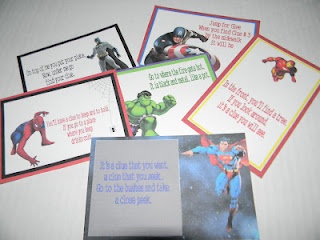 some cards with pictures of superheros on them and an envelope for someone to put in it