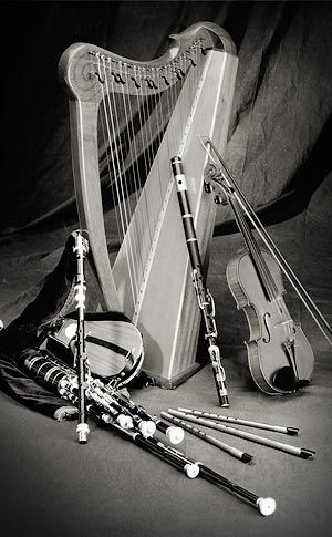 a black and white photo of musical instruments