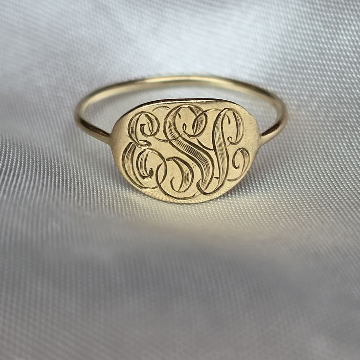 Lovely unmarked 14 karat solid yellow gold initial engraved ring oval center reading initials "ESL" in cursive Size US 5.5, contact prior to purchase for resizing inquiry oval is 8.8mm tall x 11.6mm across back of band is .9mm thick, oval part is .8mm thick weighs 1.2 grams Ships free out of Southern California Senior Rings, Oval Rings, Gold Initial, Engraved Rings, Stackable Rings, Solid Gold, Initials, Jewelry Rings, Monogram