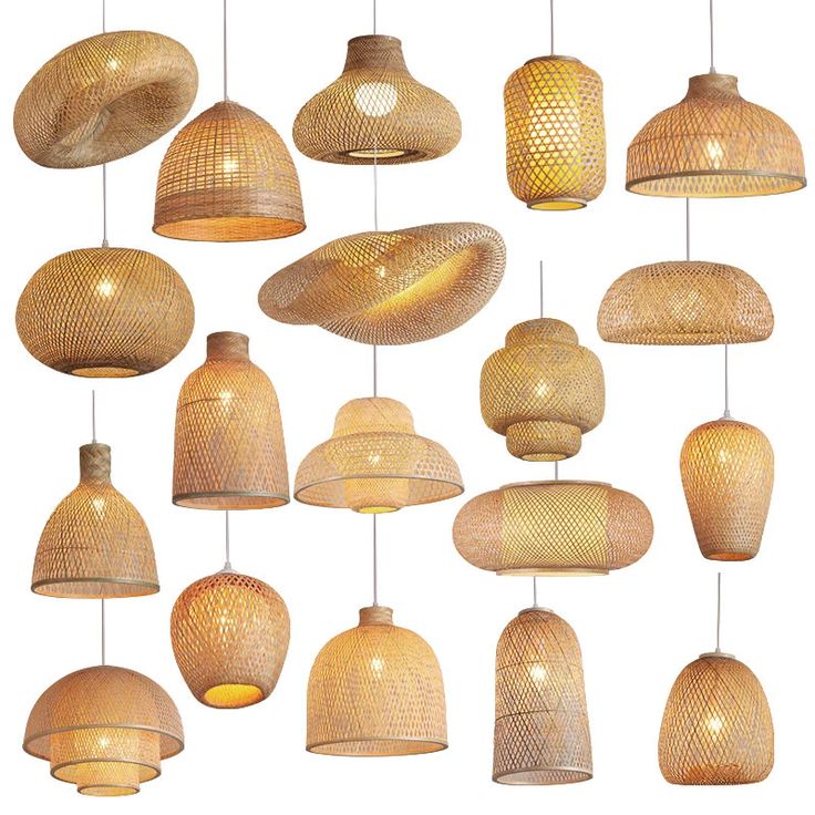 many different types of lights hanging from strings and lampshades on a white background