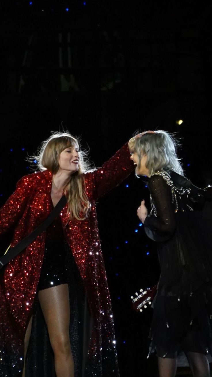 taylor and taylor performing at the concert