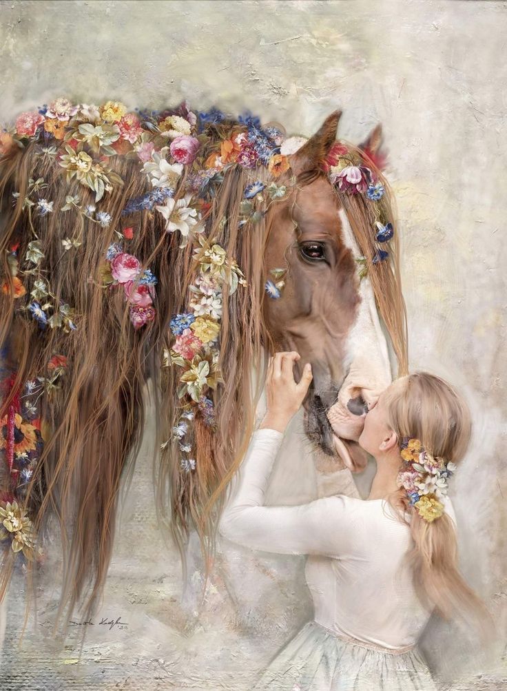 a woman is petting a horse with flowers on its head and manes around it's neck