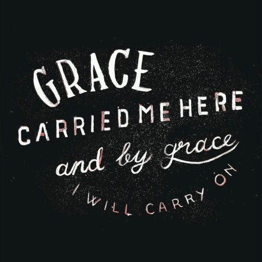 the words grace carried me here and by grace i will carry on written in white ink