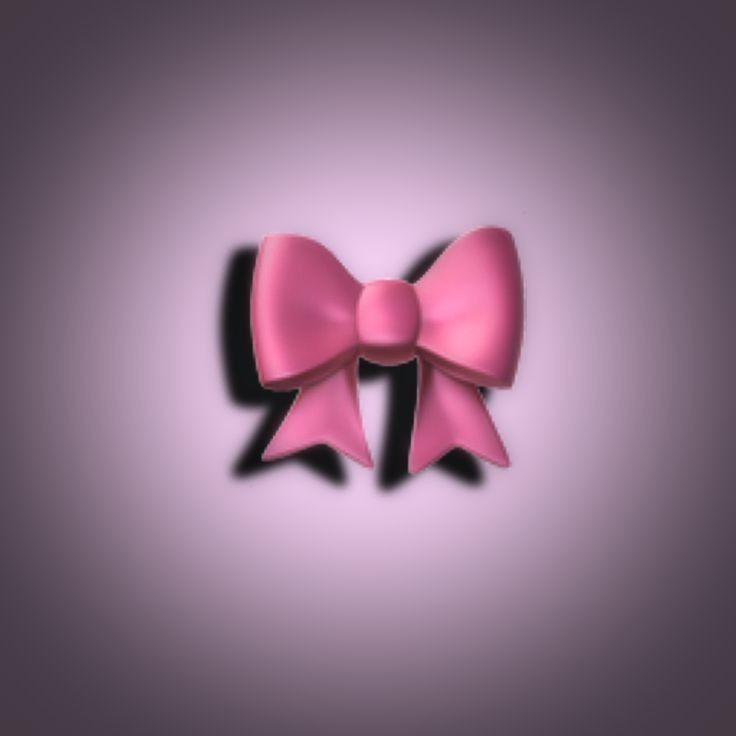 a pink bow on a purple background