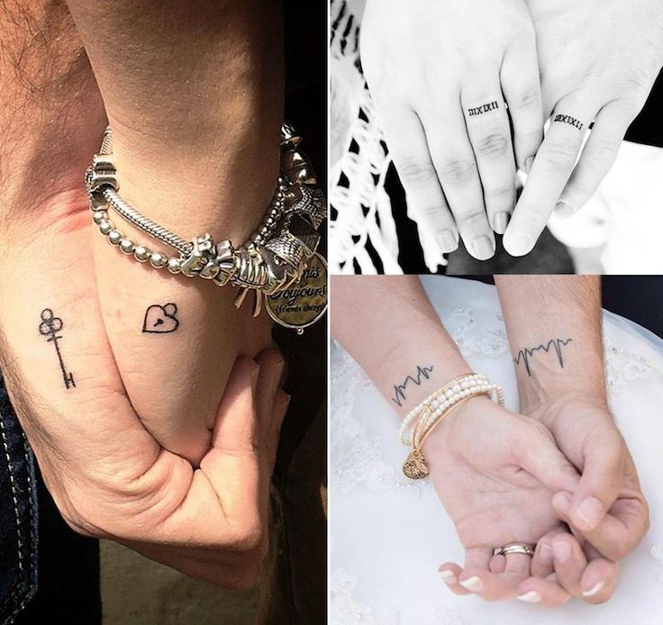 two people holding hands with tattoos on their fingers and the other one has a heart