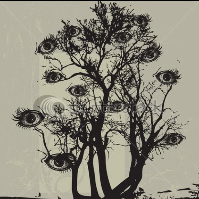 a tree with many eyes on it and an evil eye in the branches, as well as