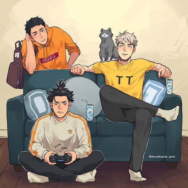 two people sitting on a couch with a cat behind them and one person holding a video game controller