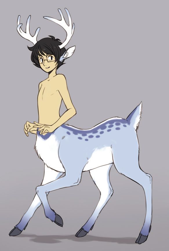 a young man riding on the back of a white and blue deer's tail