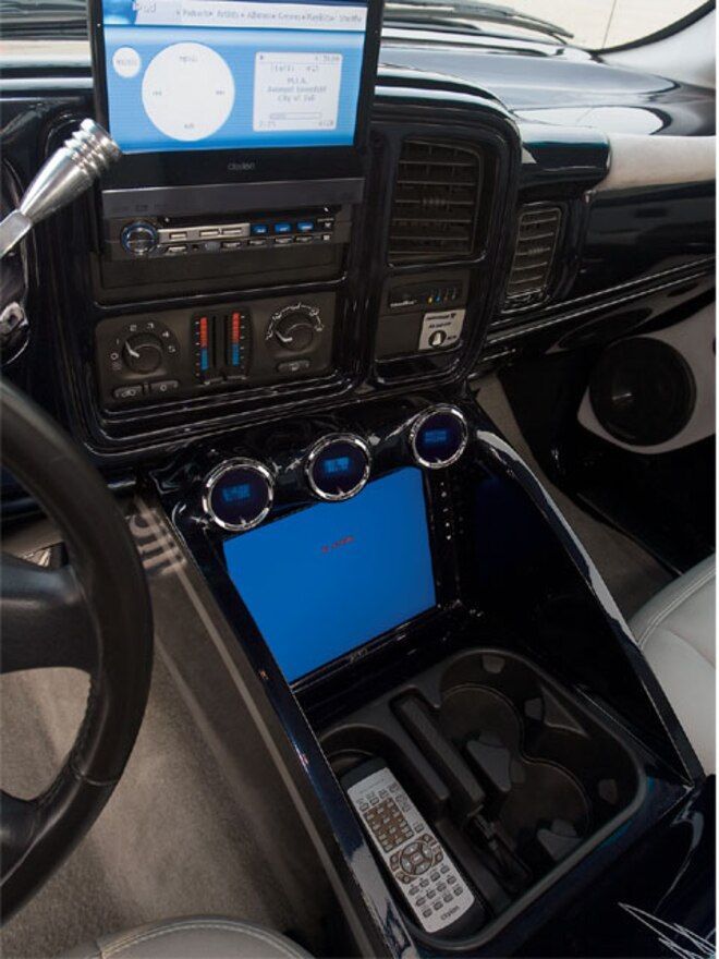 the interior of a car with electronic equipment in it