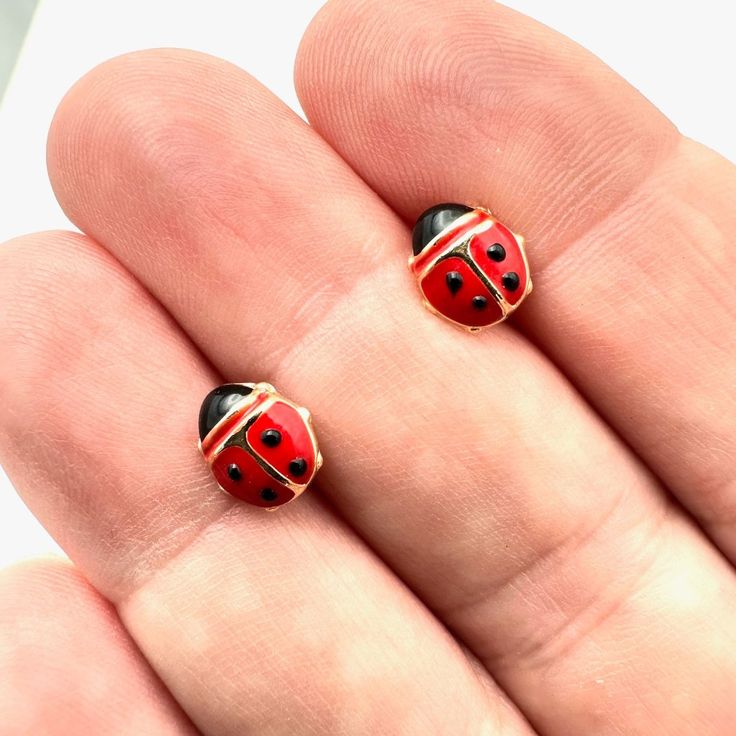 Dainty And Elegant, These Womens Earrings 14k Gold Red Black Enamel Lady Bug Studs Are Perfect For A Touch Of Sparkle And Charm. With An 8mm Size, They're Ideal For Everyday Wear Or Special Occasions. Crafted From High-Quality 14k Gold And Enamel Features A Unique Ladybug Design Measures 8 Mm In Size Suitable For Pierced Ears Perfect For Women Of All Ages Vintage And Or Estate Jewelry Items. These Items Are Preowned Items And May Have Been Previously Worn. These Jewelry Items Come From Estate Sales, Auctions, Antique Shows & Markets And Occasionally New Old Stock Items That Have Been Stored But Not Worn Fine Jewelry. We Test Our Fine Silver And Gold Pieces As Well As Ladybug Design, Ladybug Jewelry, Womens Earrings, Gold Piece, Lady Bug, Estate Sales, Pierced Ears, Black Enamel, Fine Silver