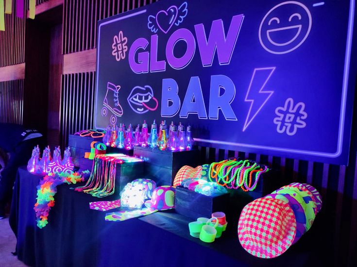 the glow bar is decorated with neon colors