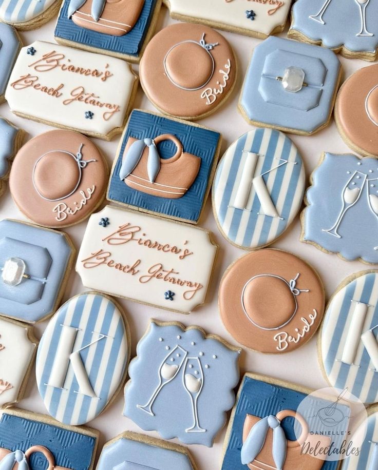 decorated cookies are arranged on a table