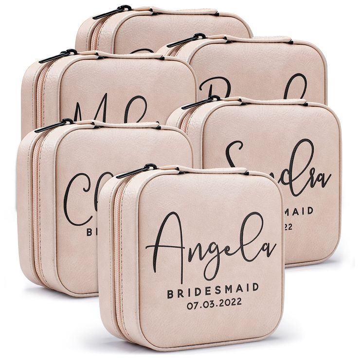 six bridesmaid cosmetic bags with the names of their wedding day written on them