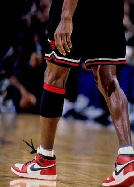 an image of a basketball player's shoes on the court