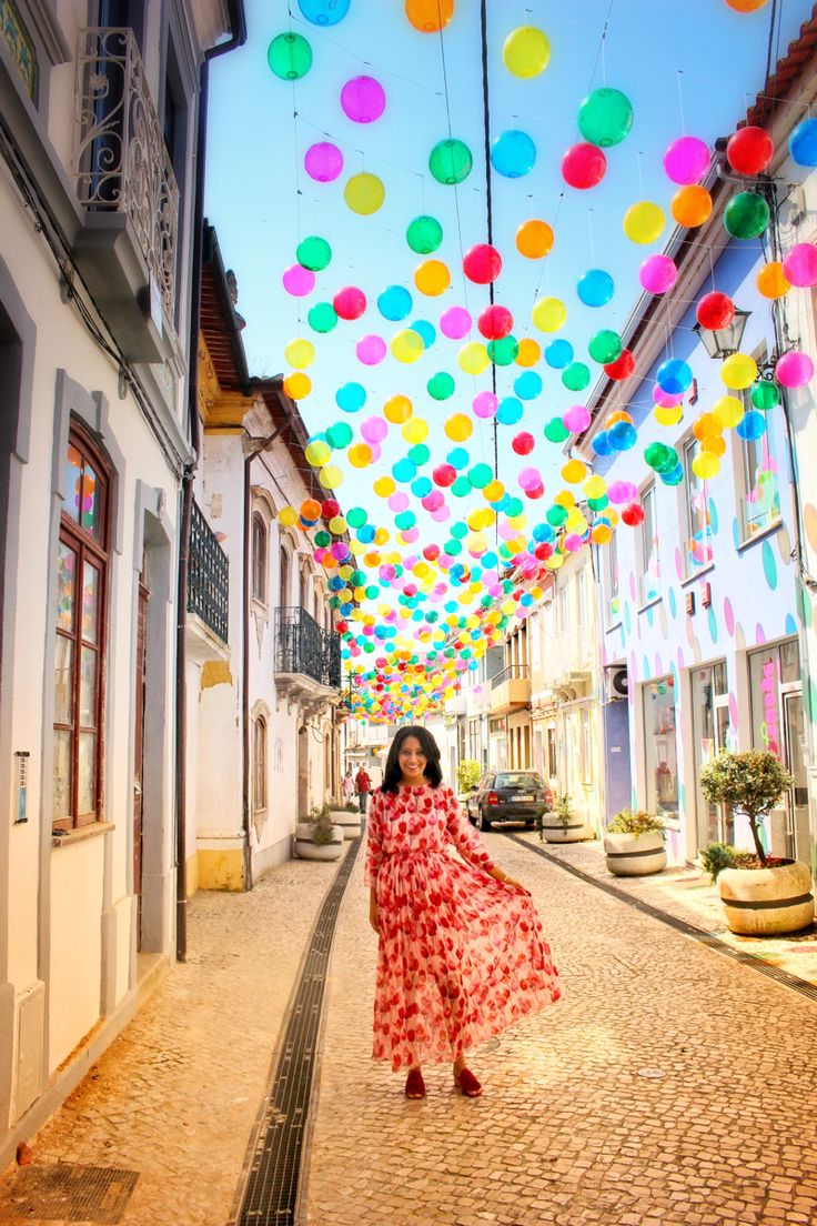 Balloon street colorful street in Portugal Day Trips From Porto, Urban Art Installation, Portugal Photography, Umbrella Street, Places In Portugal, Colorful Umbrellas, Colorful Places, Travel Umbrella, Visit Portugal