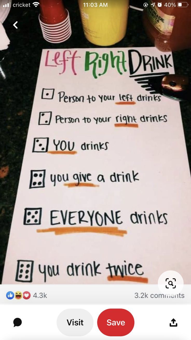 a paper sign that has been placed on top of a table with cups and drinks