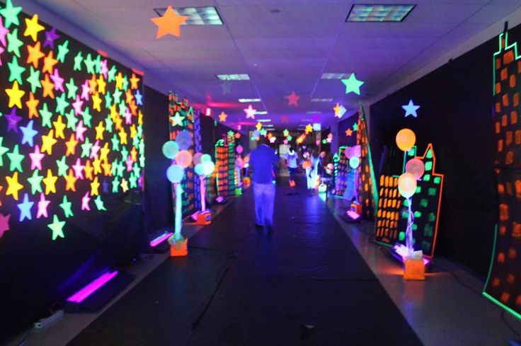 the hallway is lit up with colorful lights and stars