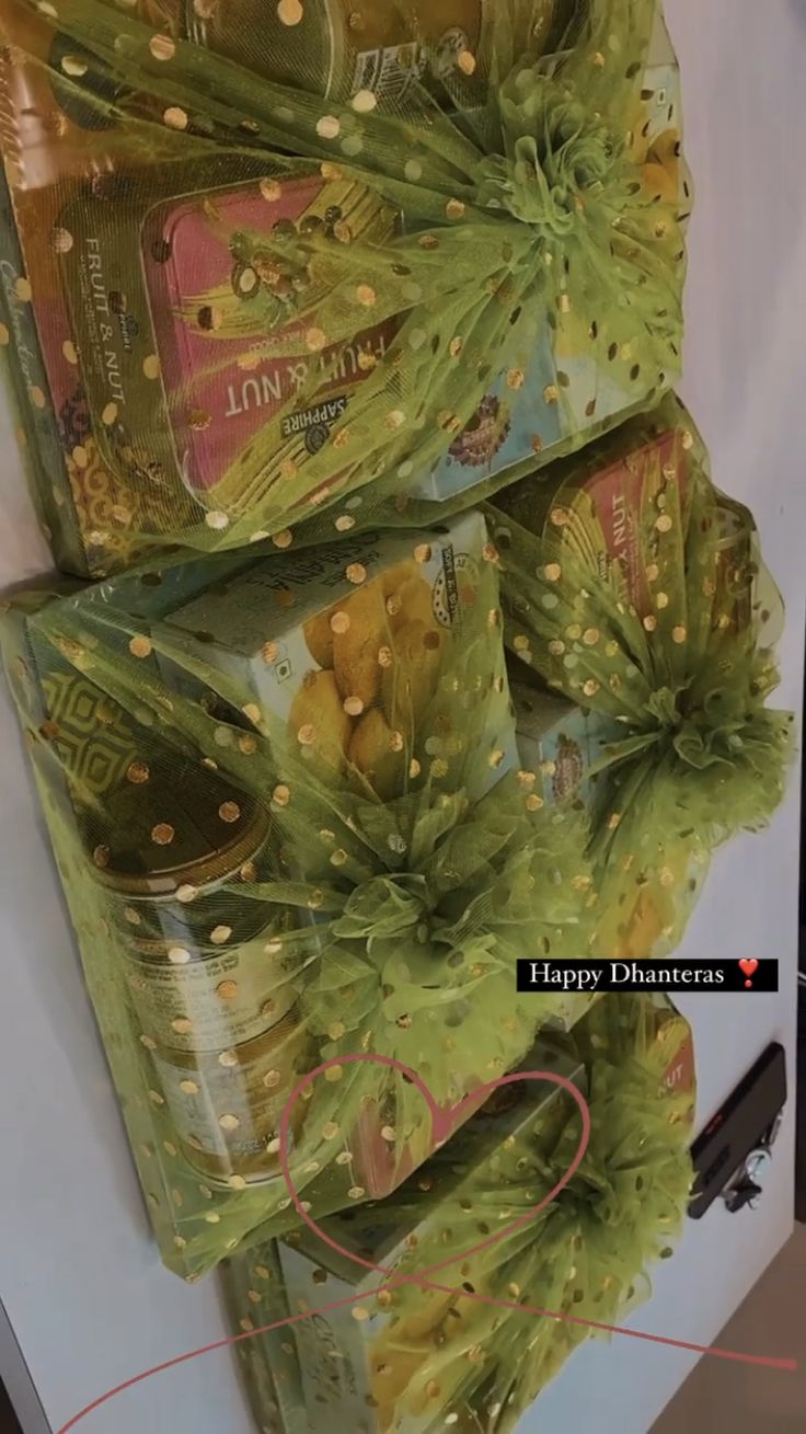 a bunch of wrapped presents sitting on top of a table