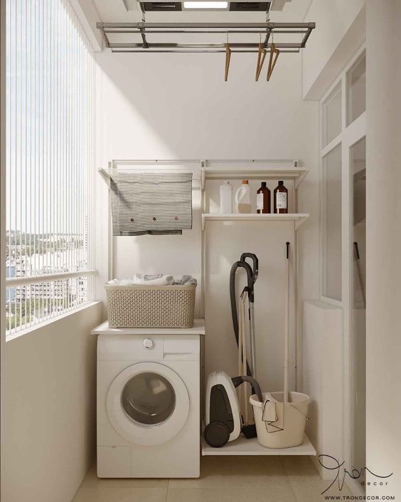 a washer and dryer in a small room