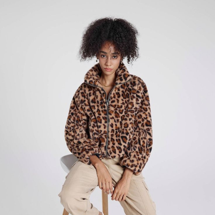 Stay stylish this fall and winter with our zip-front faux fur jacket. Featuring a stand-up collar and a cozy fuzzy texture, this loose-fit jacket ensures comfort. Side pockets add practicality, while elastic bands at the hem and sleeve cuffs create a stylish bubble effect. Available in classic black, cream, and trendy leopard print, it’s the perfect blend of fashion and function. Wild Fable™: A look for every story Skirt Tights, Half Zip Jumper, Borg Jacket, Faux Leather Biker Jacket, Knitting Women Cardigan, Long Sleeve Jumper, Boat Neck Tops, Brown Colour, Rita Ora