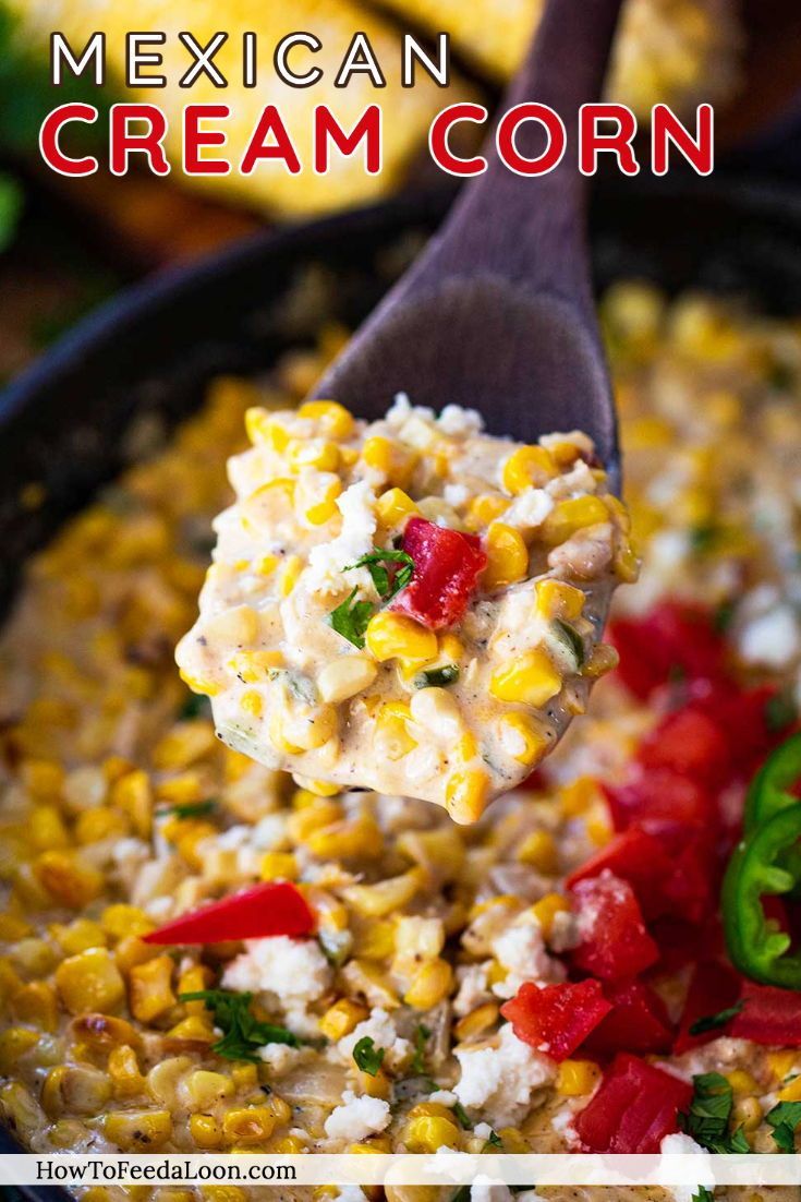 mexican cream corn in a skillet with a spoon full of it and text overlay