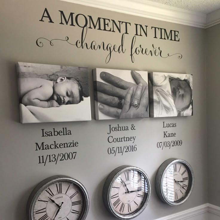 three clocks are hanging on the wall in this room