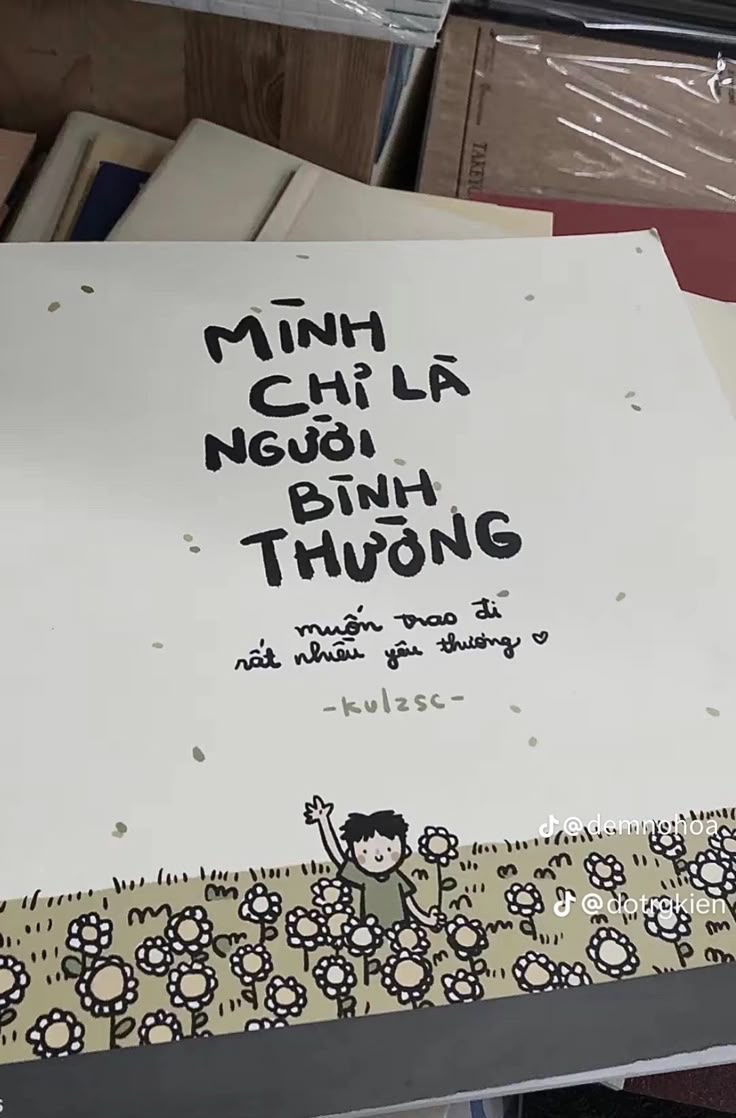 there is a sign on the table that says, minh chi la neu ninh thuong