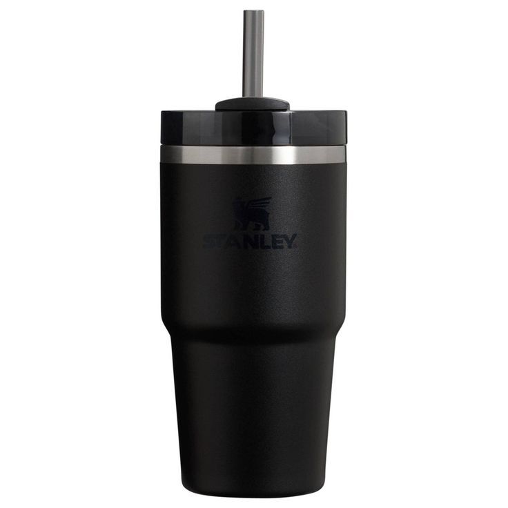 a black tumbler cup with a straw sticking out of it's side and the name stanley on it