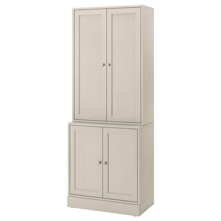 a tall white cabinet with two doors