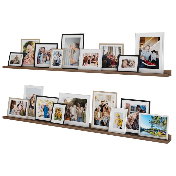 two wooden shelves with multiple pictures on them