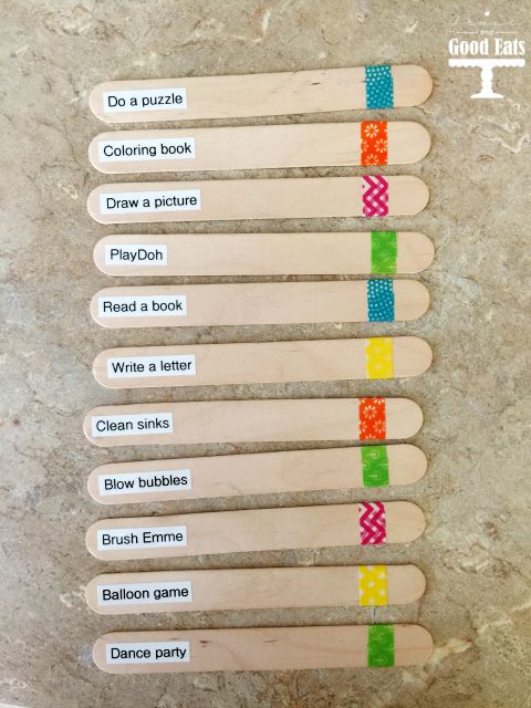 six wooden spoons with different colored designs on them